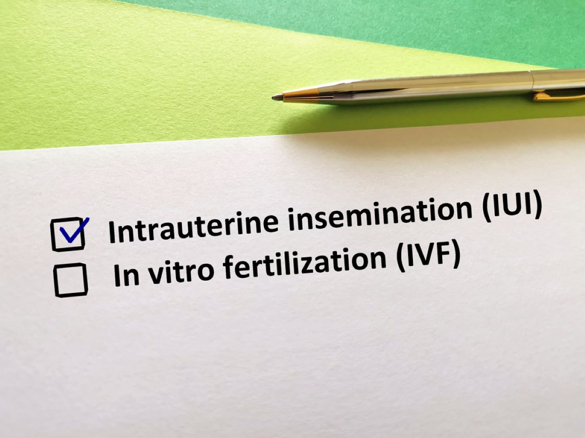 Typed checklist with the words "Intrauterine Insemination" and "In Vitro Fertilization" with the former checked