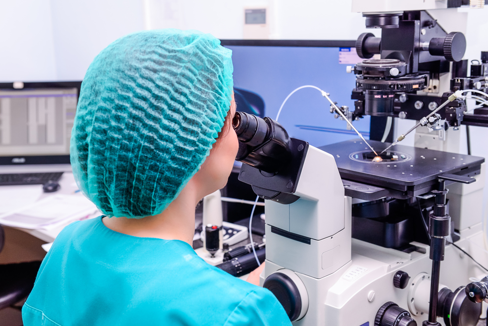 Doctor using cutting-edge reproductive technology.