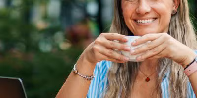A woman in her 30s smiling