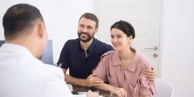 couple discussing IUI and IVF at our North Houston fertility clinic in The Woodlands