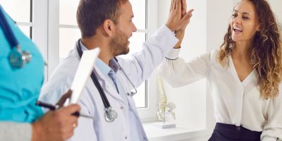 A woman talking to a Kingwood IVF specialist