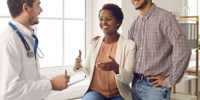 A couple consulting a fertility specialist