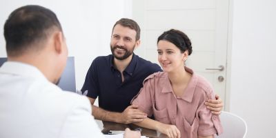couple discussing IUI and IVF at our North Houston fertility clinic in The Woodlands