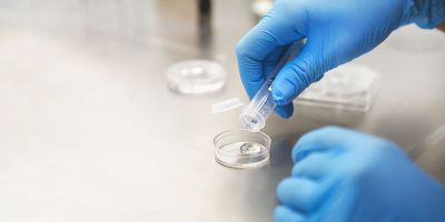 North Houston IVF specialist performing fertility testing procedure in lab
