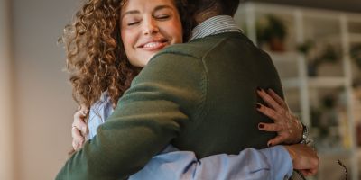 A couple embracing during their the Woodlands IVF journey