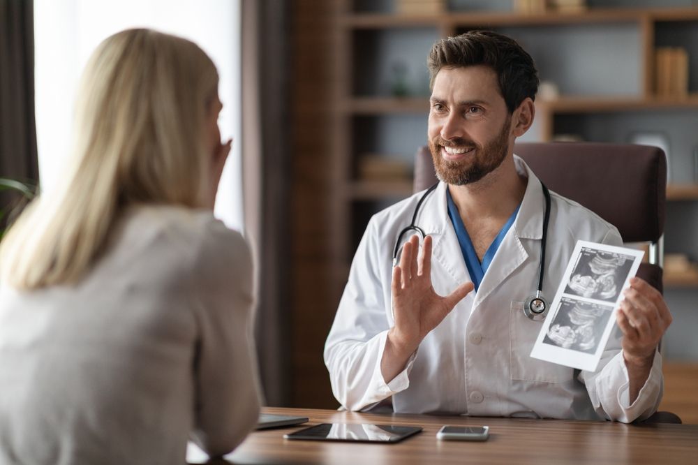 Fertility Doctor Talking to Female Patient